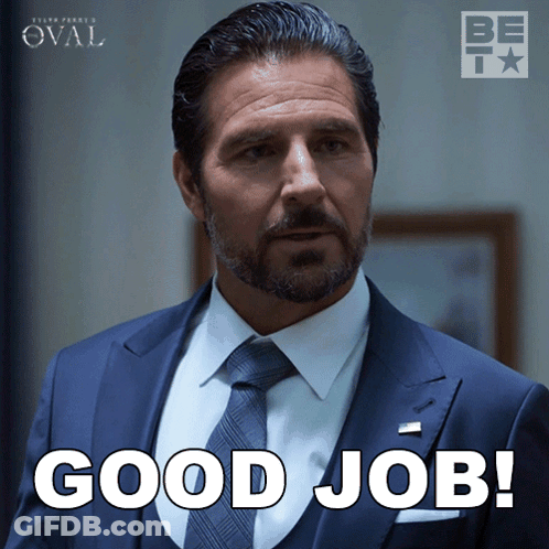 Man In Suit And Tie Clapping City Skyline GIF