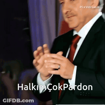 Man In Suit And Tie Clapping Halkim Çokpardon GIF