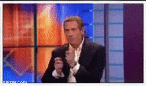 Man In Suit And Tie Clapping Hands GIF