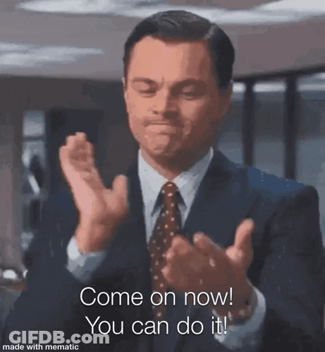 Man In Suit And Tie Clapping GIF