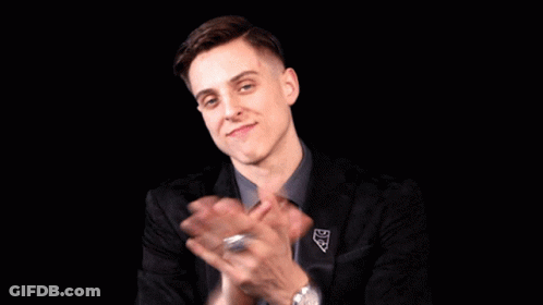 Man In Suit And Tie Clapping GIF
