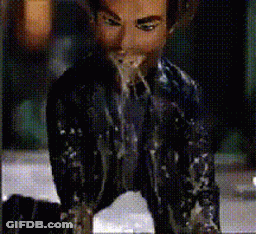 Man In Suit And Tie Covered In White Liquid GIF
