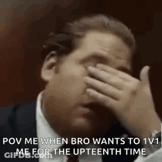 Man In Suit And Tie Covering Face GIF