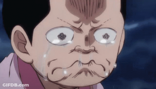 Man In Suit And Tie Crying On Couch GIF