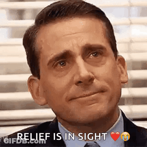 Man In Suit And Tie Crying Relief Is In Sight GIF