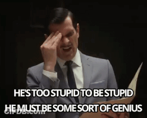 Man In Suit And Tie Crying With Paper GIF