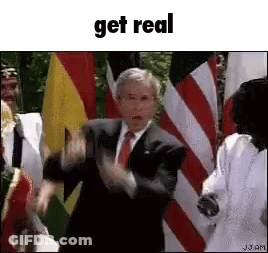 Man In Suit And Tie Dancing Below Get Real GIF