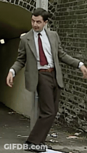 Man In Suit And Tie Dancing GIF
