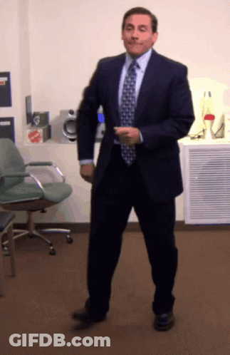 Man In Suit And Tie Dancing GIF
