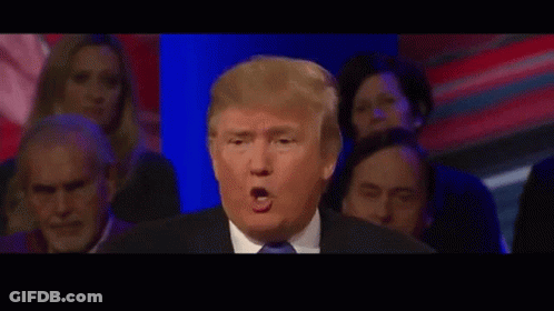 Man In Suit And Tie Dancing In Cube GIF
