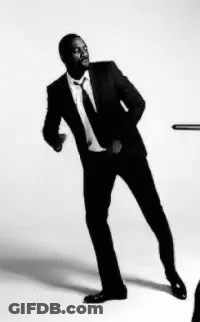 Man In Suit And Tie Dancing GIF