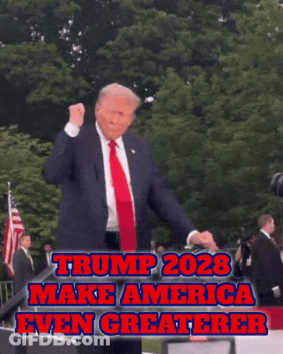Man In Suit And Tie Dancing On Stage GIF