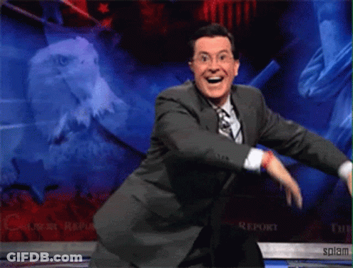 Man In Suit And Tie Dancing On Stage GIF