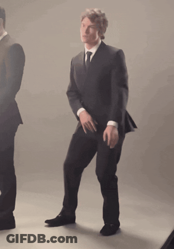 Man In Suit And Tie Dancing GIF