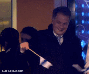 Man In Suit And Tie Dancing With Woman GIF