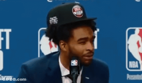 Man In Suit And Tie Detroit Pistons Hat On Microphone GIF