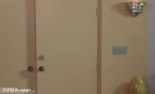 Man In Suit And Tie Doorway Andango Movieclips GIF