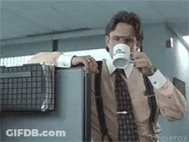 Man In Suit And Tie Drinking Mug Saying Fox GIF