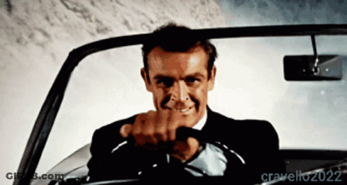 Man In Suit And Tie Driving Car 2022 GIF