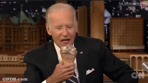 Man In Suit And Tie Eating Ice Cream Cone On CNN GIF