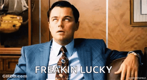 Man In Suit And Tie Freakin Lucky GIF