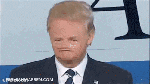 Man In Suit And Tie Funny Face Jeremiahwarren.com GIF