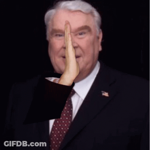 Man In Suit And Tie Giving High Five GIF