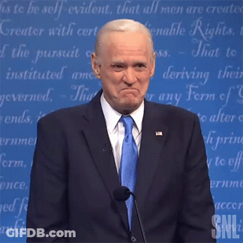 Man In Suit And Tie Giving Speech At Podium GIF