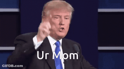 Man In Suit And Tie Giving Speech Ur Mom GIF