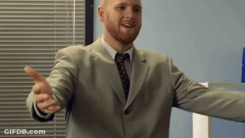 Man In Suit And Tie Giving Thumbs Up GIF