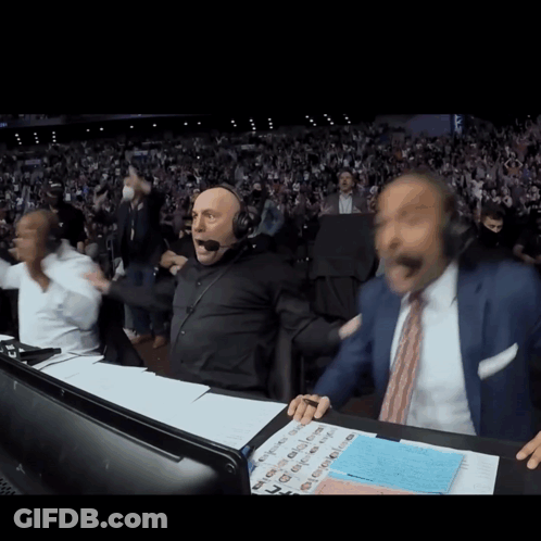 Man In Suit And Tie Headset Watching Game GIF