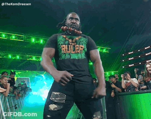Man In Suit And Tie Holding Belt Saying Gold GIF