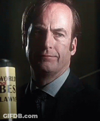 Man In Suit And Tie Holding Can Saying World No Tres GIF