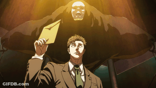 Man In Suit And Tie Holding Envelope GIF