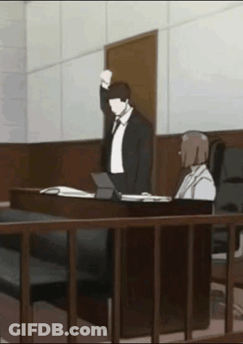 Man In Suit And Tie Holding Fist GIF