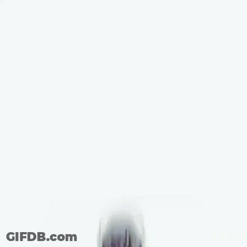 Man In Suit And Tie Holding Globe GIF