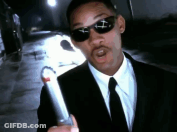 Man In Suit And Tie Holding Lighter GIF