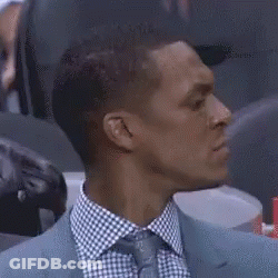 Man In Suit And Tie Holding Paper GIF