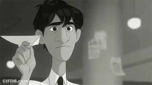 Man In Suit And Tie Holding Paper Airplane GIF