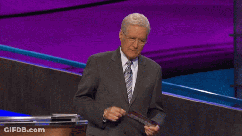 Man In Suit And Tie Holding Paper GIF