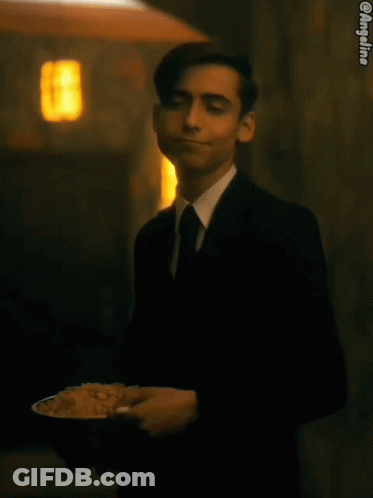 Man In Suit And Tie Holding Plate Of Rice Saying Context-Rice GIF