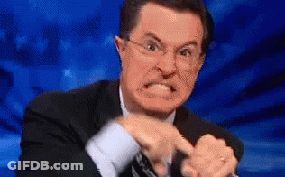 Man In Suit And Tie Holding Popcorn Says GME Over $150 GIF