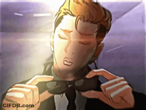 Man In Suit And Tie Holding Sunglasses GIF