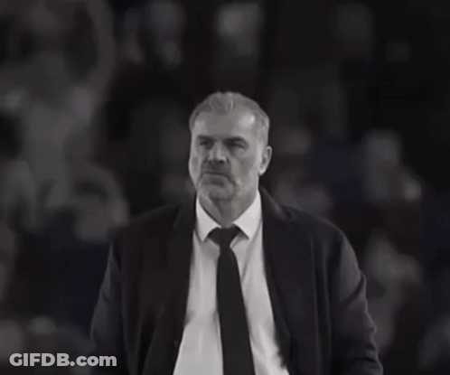Man In Suit And Tie In Crowd GIF