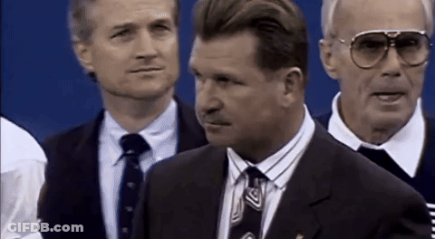 Man In Suit And Tie In Crowd GIF