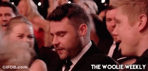 Man In Suit And Tie In Crowd GIF