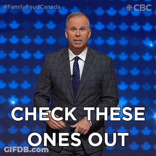 Man In Suit And Tie In Front Of Blue Background Says Check These Ones Out GIF