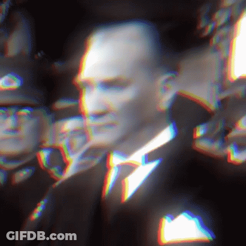 Man In Suit And Tie In Front Of Crowd GIF