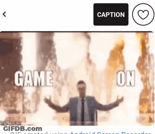 Man In Suit And Tie In Front Of Fire Saying Game On GIF
