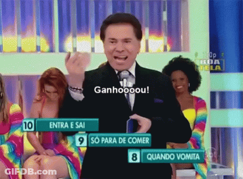 Man In Suit And Tie In Front Of Ganhooou Sign GIF